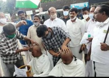 തല മുണ്ഡനം ചെയ്ത് പ്രതിഷേധം