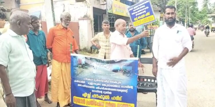 റോഡിന്റെ ശോചനീയ അവസ്ഥക്കെതിരെ ഒറ്റയാൾ സമരം നടത്തി